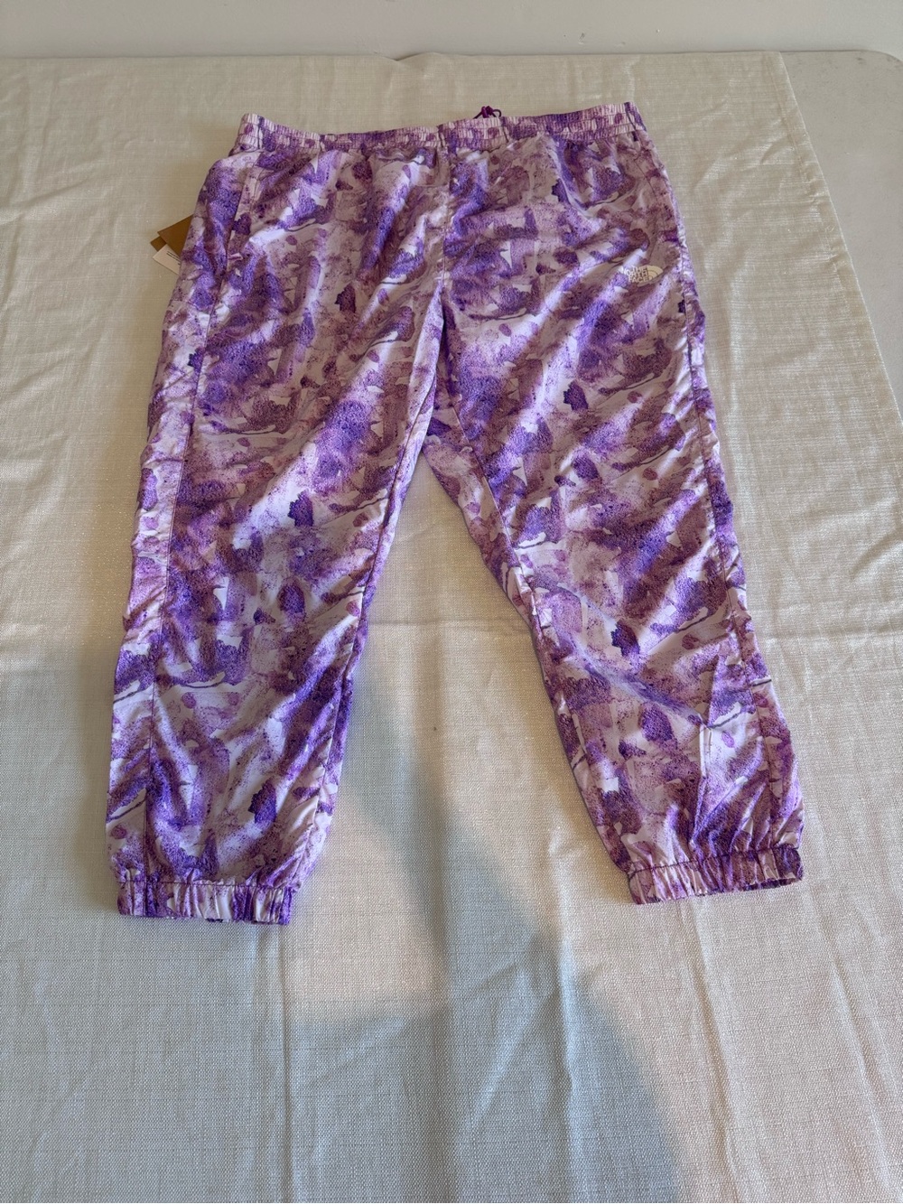 The North Face women's purple tie-dye jogger sweatpants